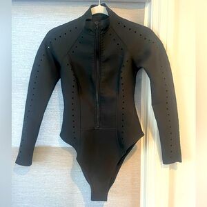 Gigi C Riley Surfsuit in great condition. Only worn once